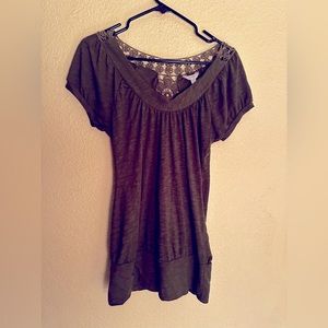 Cute simple top with nice stitched design on the back.